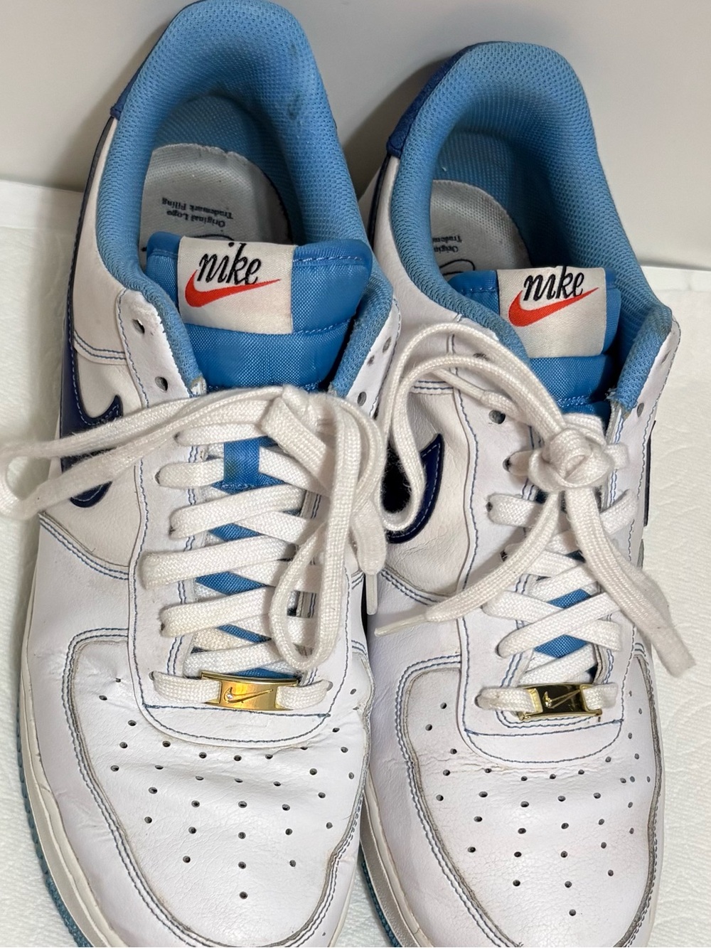 Nike White and Light Blue Low-Top Sneakers with Navy Swoosh
